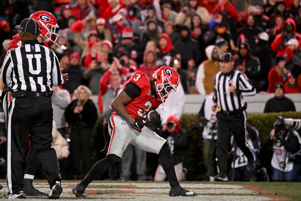 Georgia running back Nate Frazier scores a touchdown against Georgia Tech at Sanford Stadium on Friday, Nov. 29, 2024, in Athens. (Hyosub Shin/AJC)