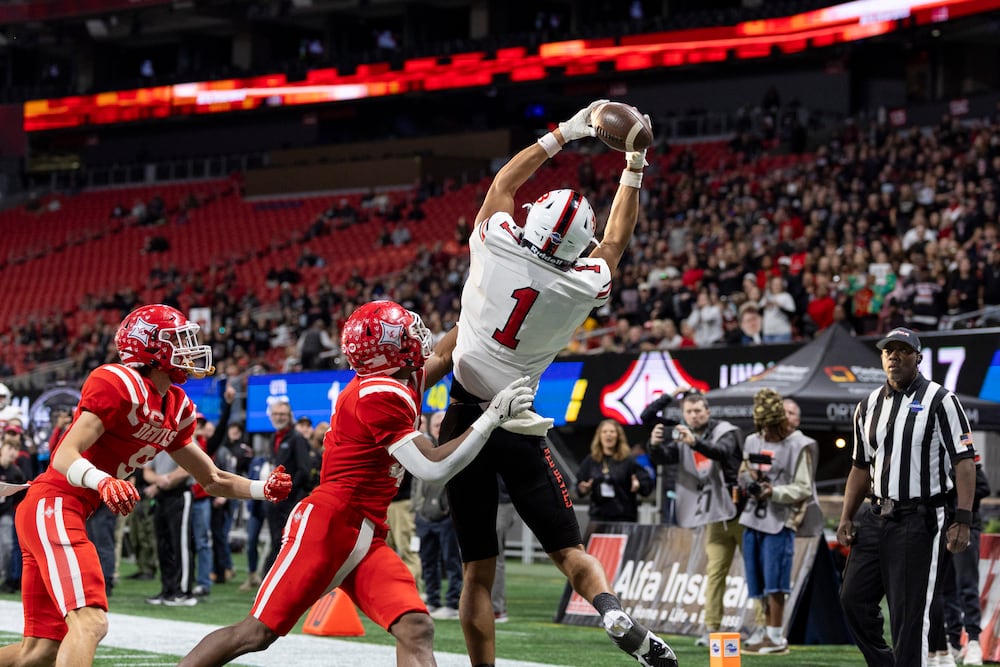 Bowdon wide receiver Kaiden Prothro (center right) makes a touchdown catch against Lincoln during the Class A Division II championship game in December in Atlanta. (Jason Getz/AJC 2025)