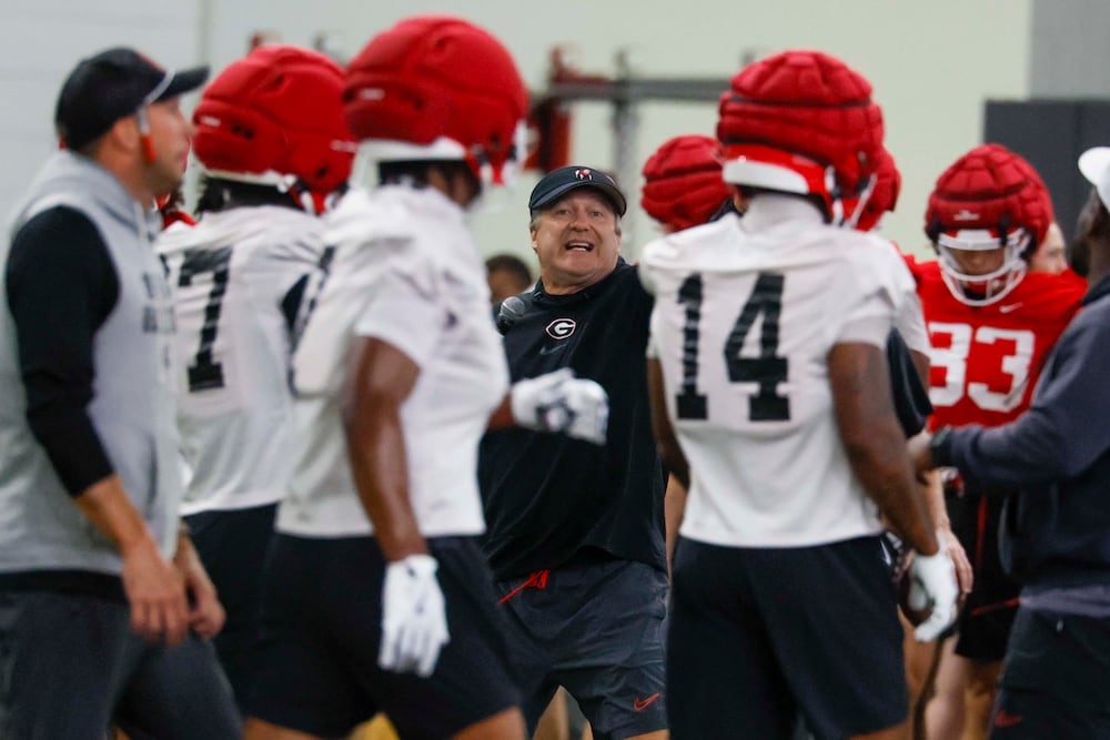 Georgia coach Kirby Smart (center, in black) gives instructions during the first fall football practice Wednesday, Aug. 5, 2026, at the practice facility in Athens. (Miguel Martinez/AJC)