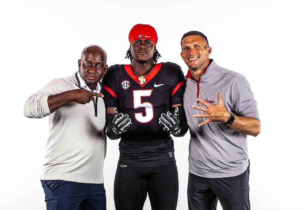 Douglas County coach Johnny White compared safety Adryan Cole (center) to SEC legend Eric Berry, who White coached in high school. (Courtesy)