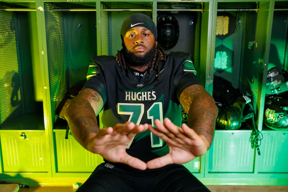 2026 AJC Super 11 Hughes Kelsey Adams Jr., an offensive tackle committed to University of Georgia, poses for a portrait at Langston Hughes High School. (Miguel Martinez/AJC)