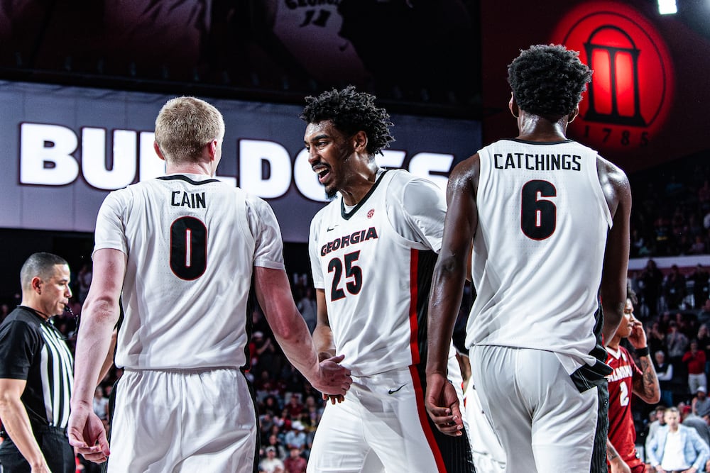 Georgia guard Blue Cain (left), Georgia forward Justin Abson and Georgia forward Kanon Catchings during Georgia's game against Alabama earlier this month.