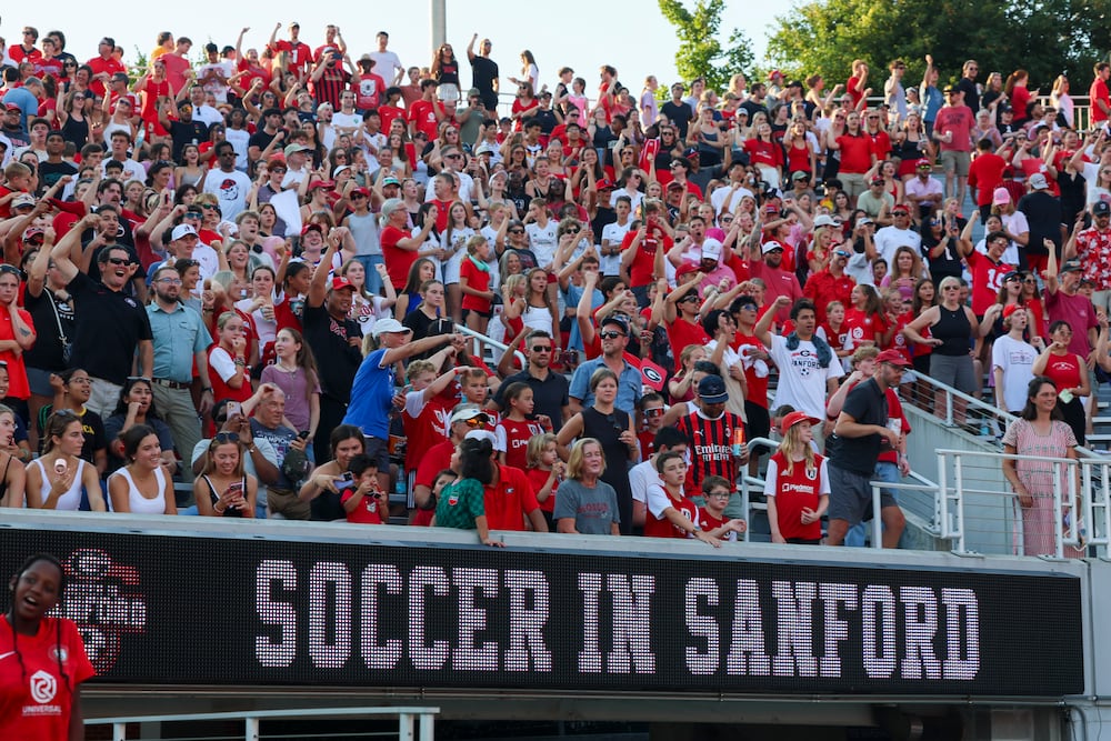 Fans cheer before the start of Georgia's "Soccer in Sanford" match against James Madison at Sanford Stadium on Thursday, Aug. 20, 2026, in Athens. (Jason Getz/AJC)
