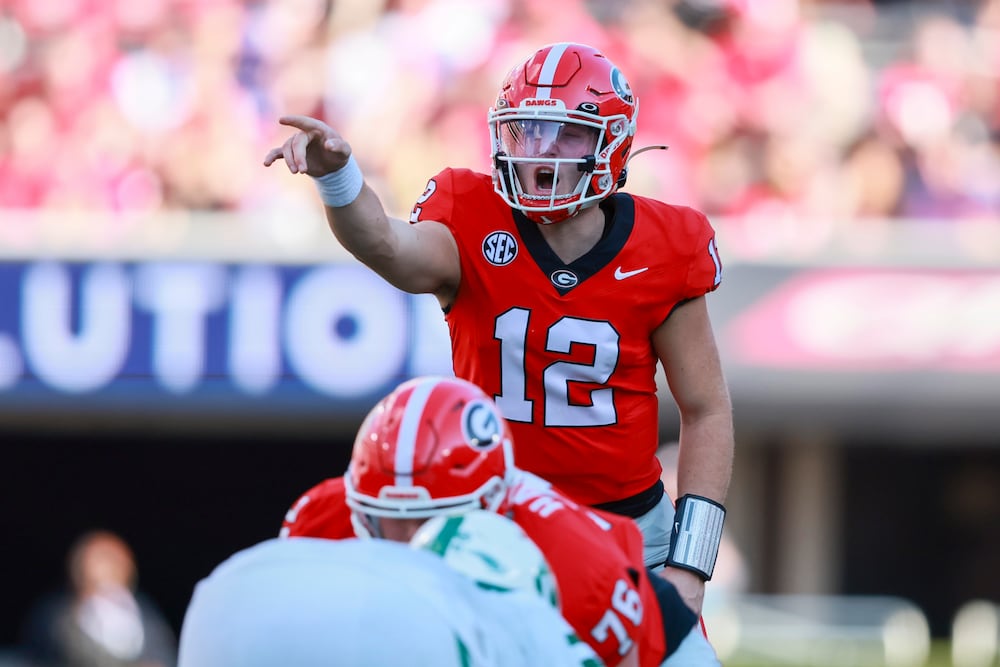 Georgia quarterback Ryan Puglisi calls a play at the line of scrimmage before an offensive snap during the second half against Charlotte at Sanford Stadium on Friday, Nov. 22, 2025, in Athens. (Jason Getz/AJC)