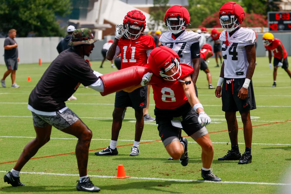 Georgia wide receiver Landon Roldan (right) runs a drill during the Bulldogs' first fall football practice on Wednesday, Aug. 5, 2026, in Athens. (Miguel Martinez/AJC)