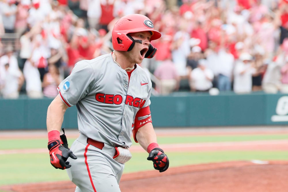 Georgia Bulldogs catcher Daniel Jackson (3) reacts after hitting a two-run home run to give the team an 11-9 lead in the tenth inning of game 2 of the NCAA Super Regional at Foley Field on Sunday, June 7, 2026, in Athens. Miguel Martinez/AJC)