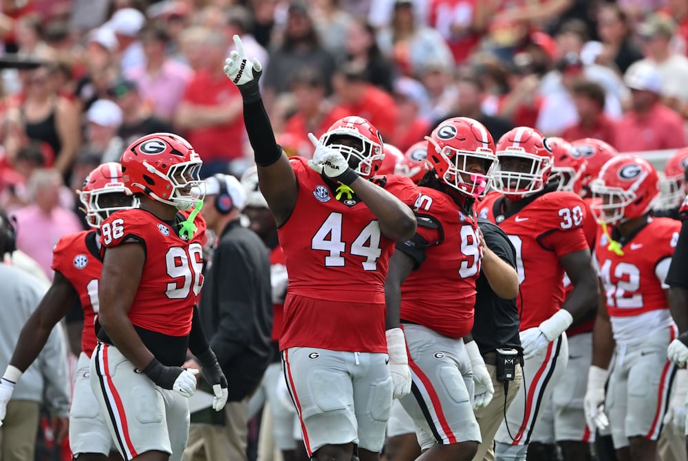 Georgia defensive lineman Jordan Hall celebrates after blocking a kick by Vanderbilt's Brock Taylor during the first half of Saturday's game. (Hyosub Shin/AJC)