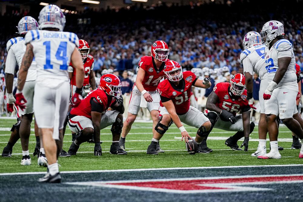 Georgia quarterback Gunner Stockton (14), Georgia offensive lineman Malachi Toliver (51) during Georgias game against Ole Miss at the 2026 Allstate Sugar Bowl at Caesars Superdome in New Orleans, La., on Thursday, Jan. 1, 2026. (Tony Walsh/UGAAA)