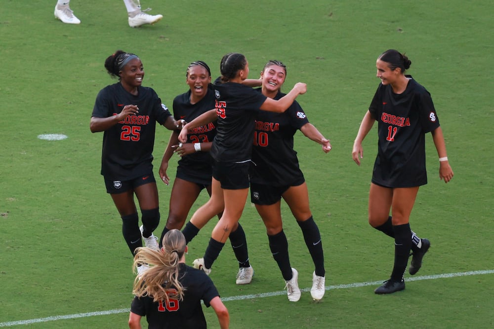 Georgia midfielder Ava Stack (second from right) celebrates her goal with teammates during the first half of their "Soccer in Sanford" match against James Madison on Thursday, Aug. 20, 2026, in Athens. (Jason Getz/AJC)