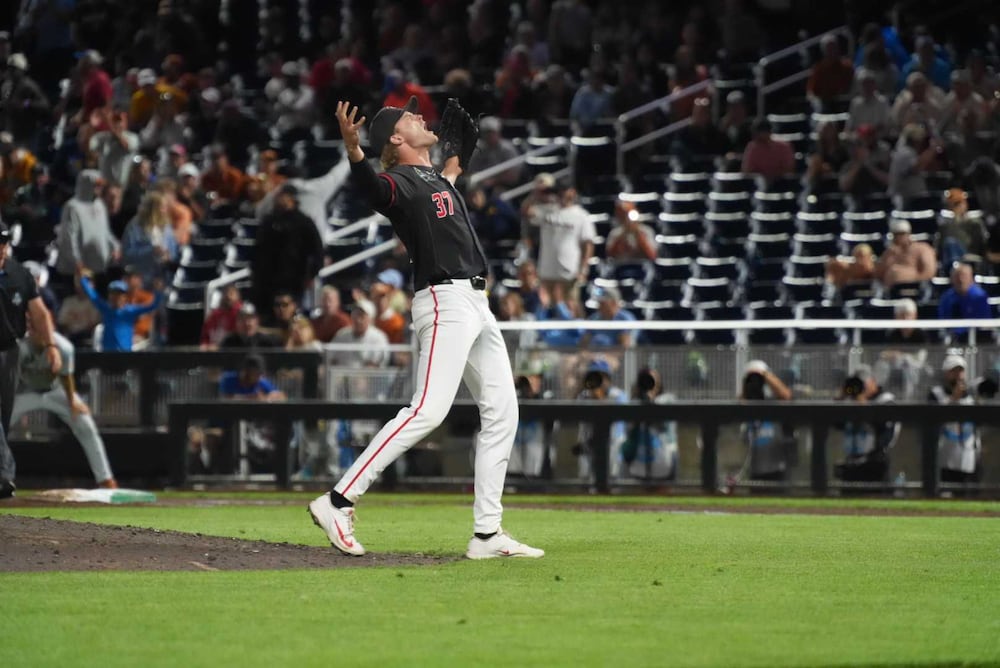 Georgia pitcher Joey Volchko celebrates after throwing the last pitch of the College World Series game against Texas on Saturday, June 13, 2026, in Omaha, Nebraska. It marked Volchko's first career complete game. (Cody Chaffins/AJC)