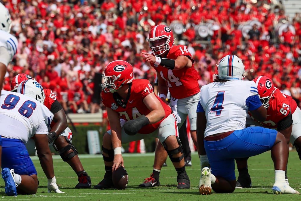 Georgia quarterback Gunner Stockton (14) and Georgia offensive lineman Drew Bobo (74) prepares for an offensive play during their game against Tennessee State at Sanford Stadium, Saturday, Sept. 5, 2026, in Athens, Ga. Georgia won 63-3. Jason Getz/AJC)