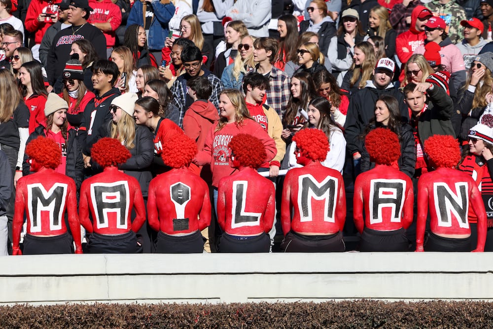 Georgia students show their appreciation for quarterback Stetson Bennett, also known as the Mailman, during the 2022 national championship celebration at Sanford Stadium on Saturday, Jan. 14, 2023, in Athens. (Jason Getz/AJC)