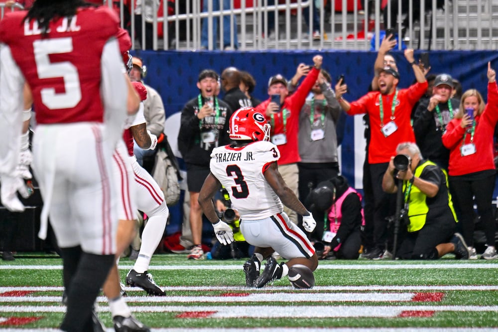Georgia running back Nate Frazier runs 9 yards for a touchdown against Alabama during their SEC championship game at Mercedes-Benz Stadium on Saturday, Dec. 6, 2025, in Atlanta. (Hyosub Shin/AJC)