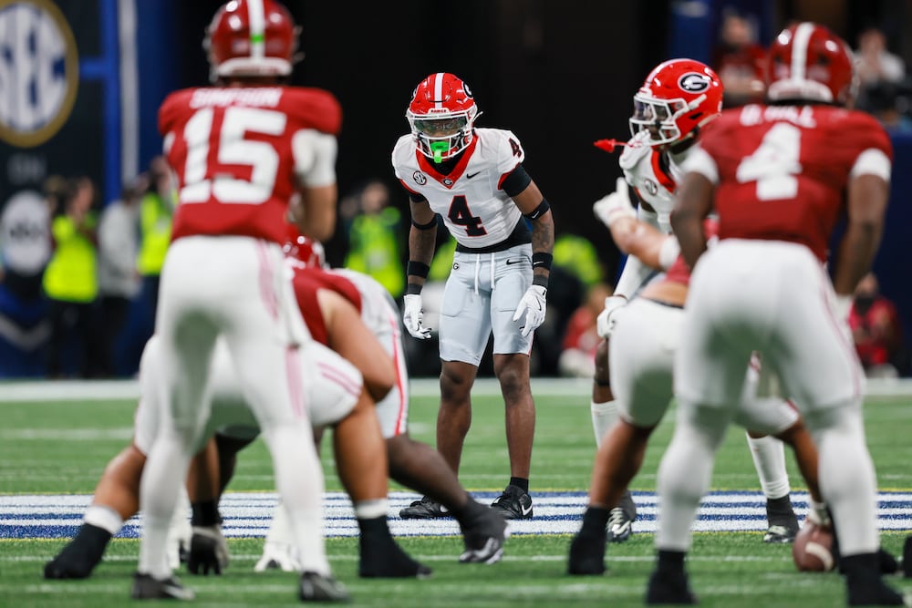 Georgia defensive back KJ Bolden (4) prepares for a defensive snap against Alabama during the SEC Championship game Dec. 6, 2025. (Jason Getz/AJC)
