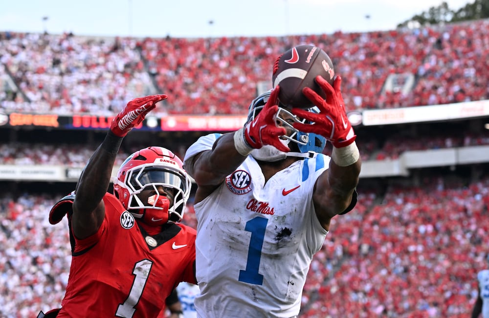 Mississippi wide receiver De'Zhaun Stribling (right) is unable to catch under pressure from Georgia defensive back Ellis Robinson IV during their game at Sanford Stadium on Saturday, Oct. 18, 2025, in Athens. (Hyosub Shin/AJC)