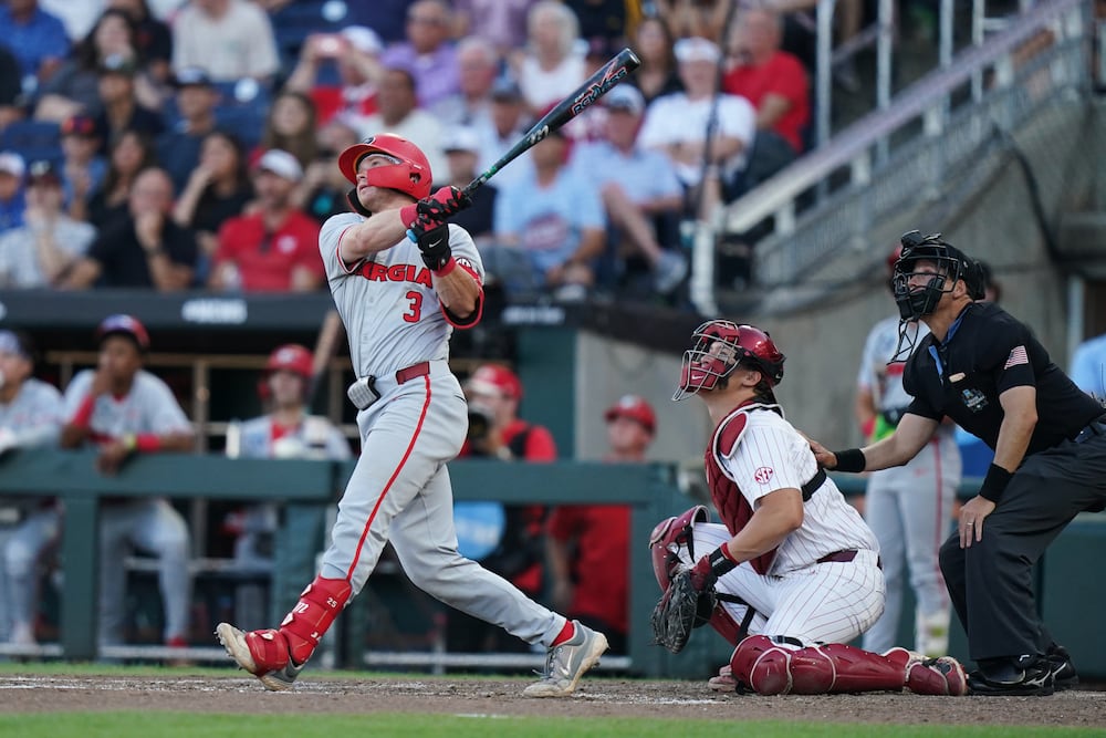 Georgia catcher Daniel Jackson hits a homer during a College World Series game against Oklahoma on Monday, June 15, 2026, in Omaha, Nebraska. (Vera Nieuwenhuis/AP)