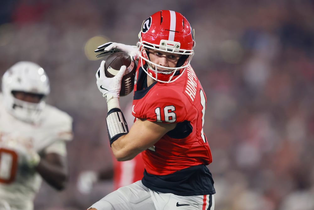 Georgia wide receiver London Humphreys catches a 30-yard touchdown pass during the fourth quarter against Texas in their NCAA football game at Sanford Stadium, Saturday, Nov. 15, 2025, in Athens, Ga. Georgia won 35-10. (Jason Getz/AJC)
