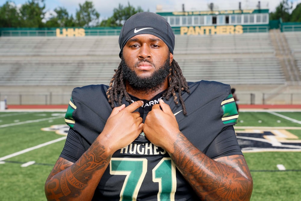 2026 AJC Super 11 Hughes Kelsey Adams Jr., an offensive tackle committed to University of Georgia, poses for a portrait at Langston Hughes High School. (Miguel Martinez/AJC)