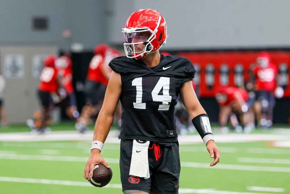 Georgia quarterback Gunner Stockton (14) holds the ball during their first football practice at the University of Georgia practice facility, Wednesday, August 5, 2026, in Athens, Ga. (Miguel Martinez/AJC)