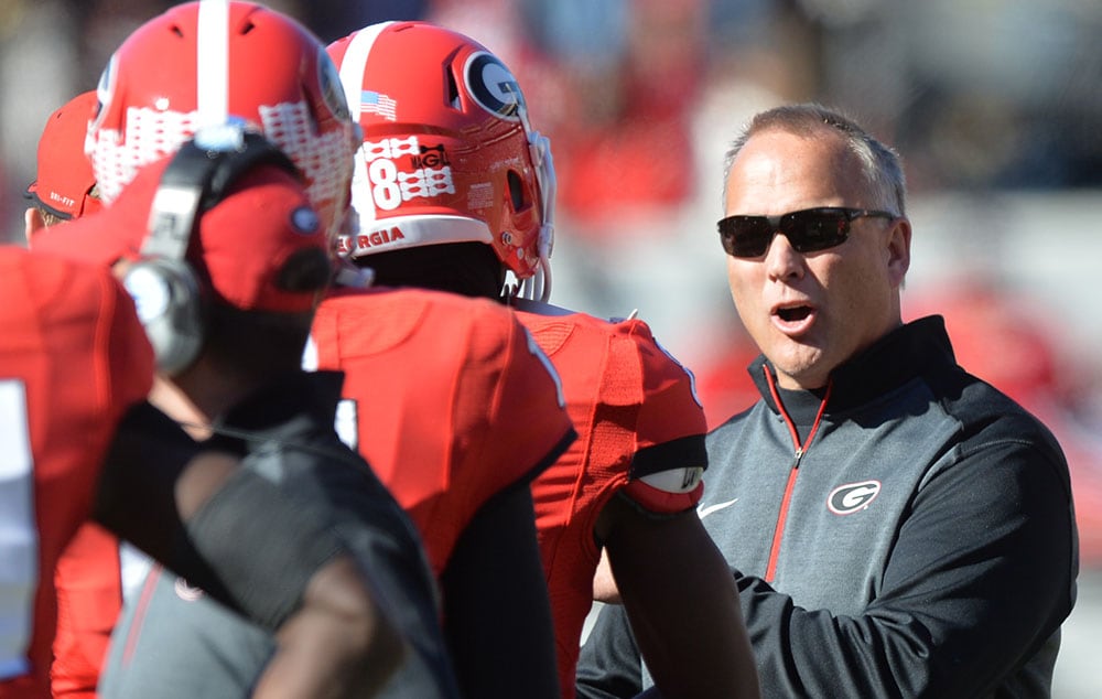 November 29, 2014 Athens - Georgia Bulldogs head coach Mark Richt instructs in the first half against the Georgia Tech Yellow Jackets at Sanford Stadium in Athens on Saturday, November 29, 2014. HYOSUB SHIN / HSHIN@AJC.COM