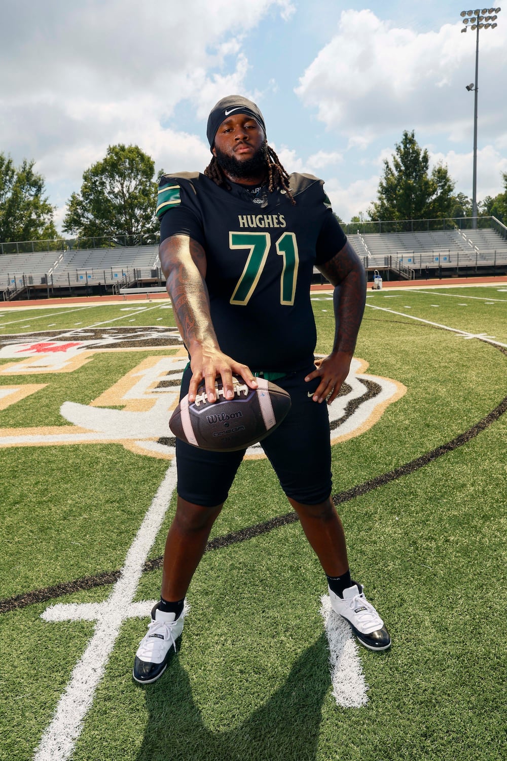 2026 AJC Super 11 Hughes Kelsey Adams Jr., an offensive tackle committed to University of Georgia, poses for a portrait at Langston Hughes High School. (Miguel Martinez/AJC)