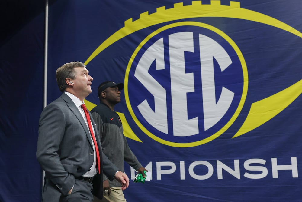Georgia Bulldogs head coach Kirby Smart enters Mercedes-Benz Stadium for the SEC Championship game against the LSU Tigers in 2022. (Jason Getz/AJC)