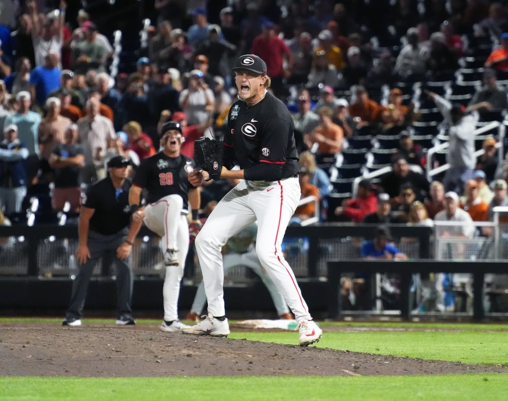 Georgia pitcher Joey Volchko celebrates after finishing a complete game against Texas during the College World Series on Saturday, June 13, 2026, in Omaha, Neb. (Cody Chaffins/AJC)