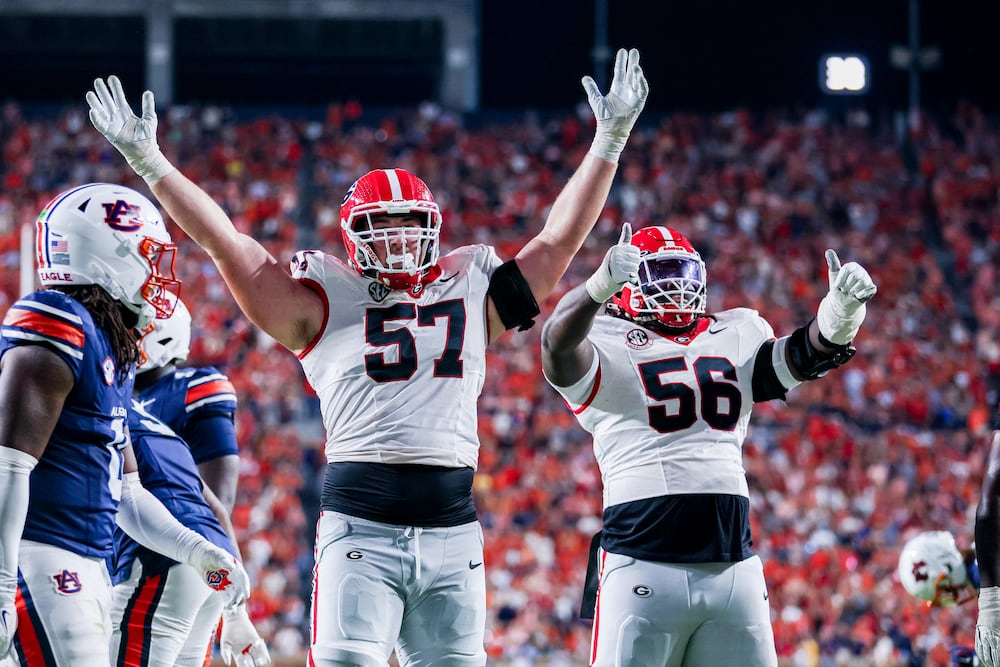 Georgia offensive lineman Monroe Freeling (57), Georgia offensive lineman Micah Morris (56) during Georgias game against Auburn at Jordan-Hare Stadium in Auburn, Al., on Saturday, Oct. 11, 2025. (Conor Dillon/UGAAA)
