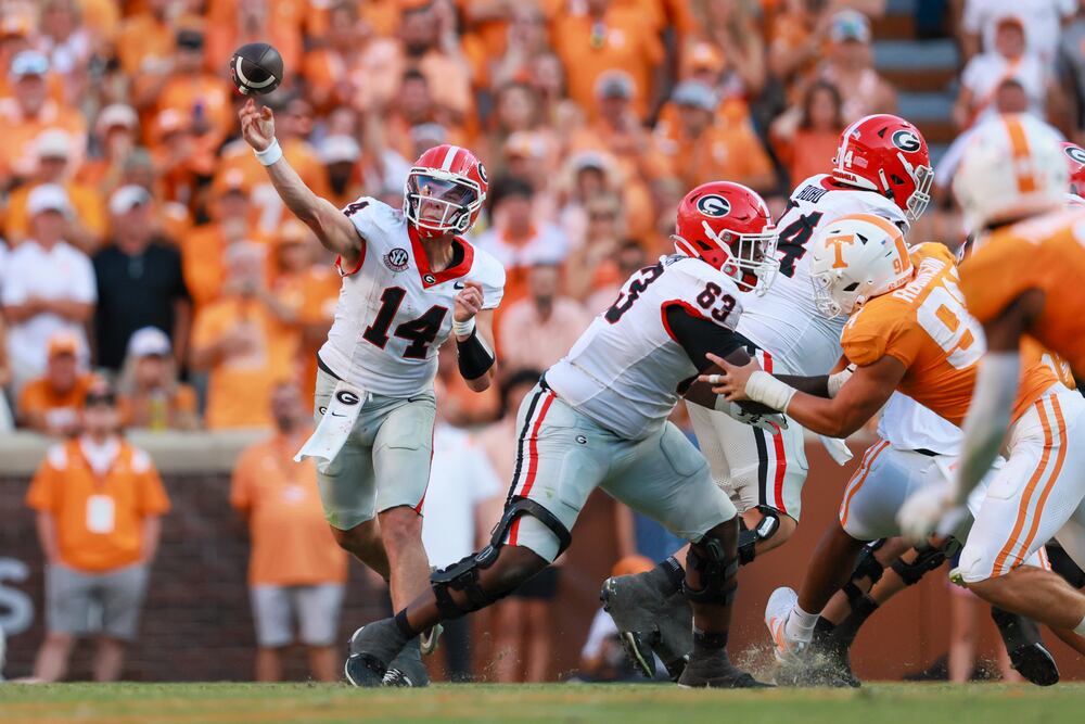 Georgia quarterback Gunner Stockton (14) attempts a pass during the fourth quarter against Tennessee at Neyland Stadium, Saturday, September 13, 2025, in Knoxville, Tenn. Georgia won 44-41 in overtime. (Jason Getz / AJC)