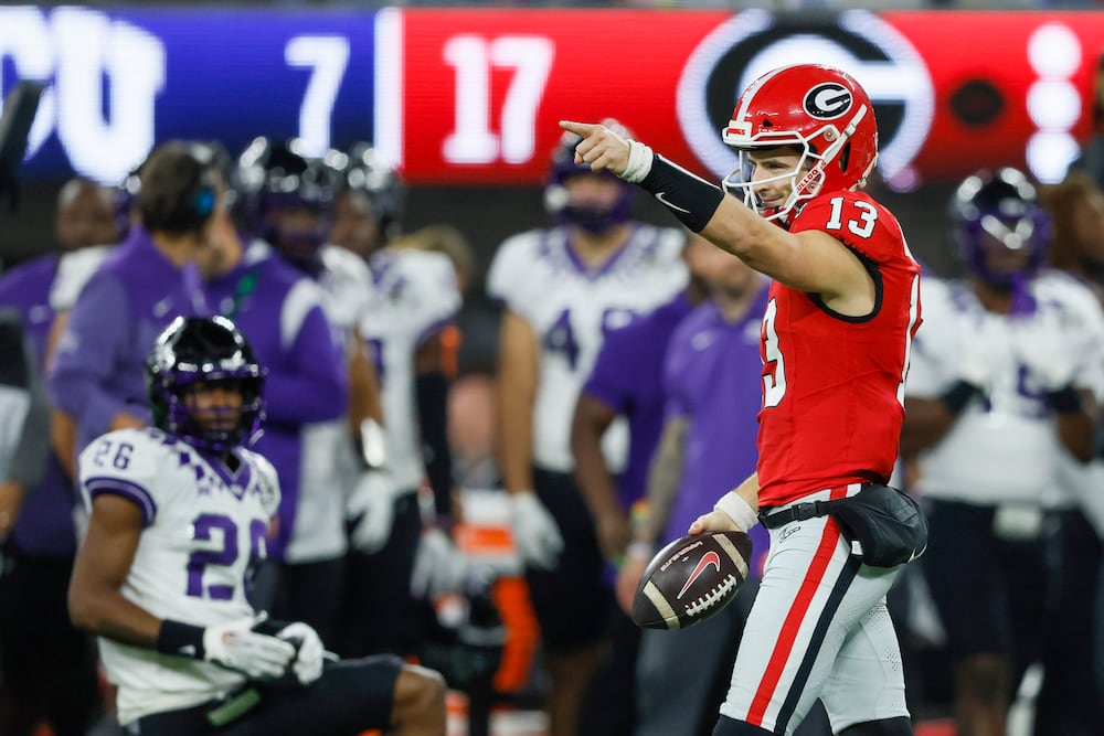 Bulldogs quarterback Stetson Bennett reacts after a first down run against TCU during the College Football Playoff national championship game at SoFi Stadium on Monday, Jan. 9, 2023, in Los Angeles. (Jason Getz/AJC)